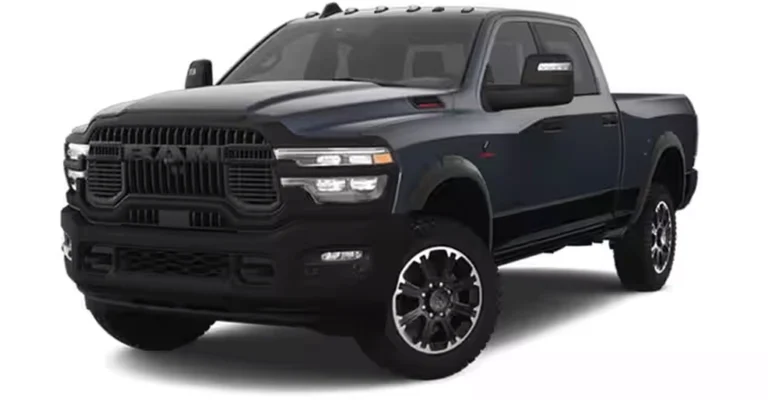 A dark blue Ram 2500 Power Wagon pickup truck is showcased against a stark white background.