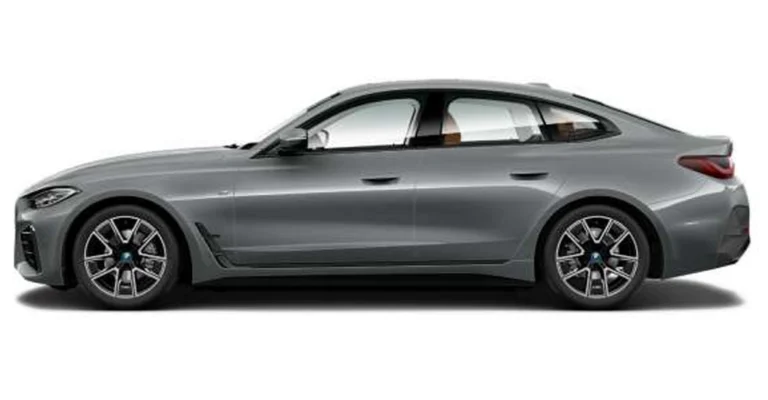 A side view of a gray BMW 4 Series Gran Coupe, showcasing its sleek design and sporty features.