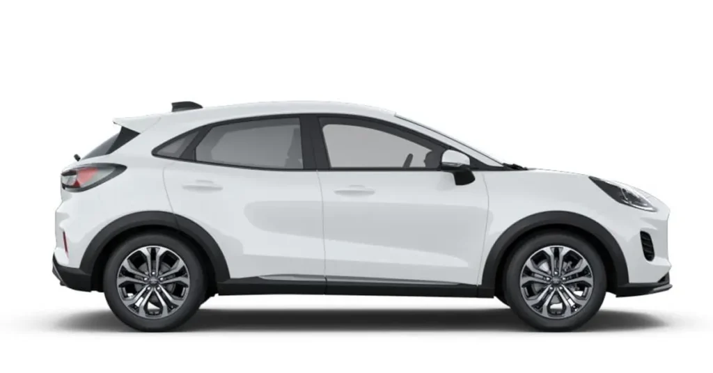 Side view of a white Ford Puma car on a white background. The car has black wheel arches and black rims. The windows are tinted. The car is in good condition.