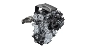 A detailed studio shot of a modern internal combustion engine, showcasing its intricate components and design.