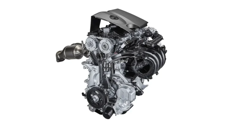 A detailed studio shot of a modern internal combustion engine, showcasing its intricate components and design.