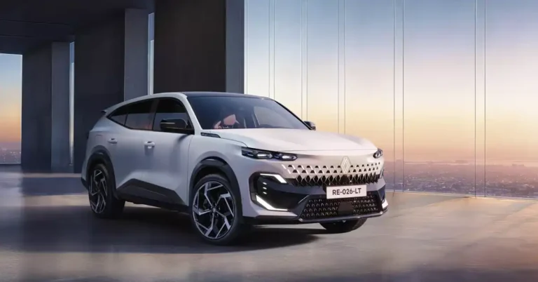 A white RENAULT FILANTE ESPRIT ALPINE SUV is parked in a modern, minimalist showroom with large windows overlooking a city at sunset. The car is positioned at an angle, showcasing its front and side profile. The interior of the showroom features dark, geometric pillars and a polished concrete floor that reflects the car and the warm hues of the sky.