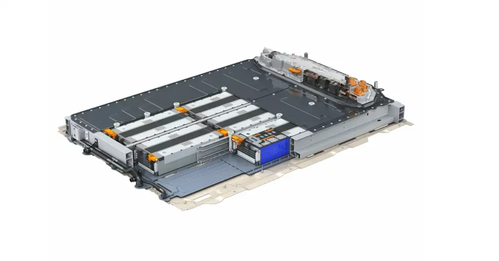 A detailed, high-angle studio shot showcases an Audi Q3 e-tron electric vehicle battery pack against a stark white background.